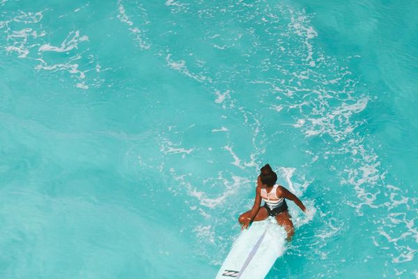 Dynamic shot of a person mid-movement, conveying energy.